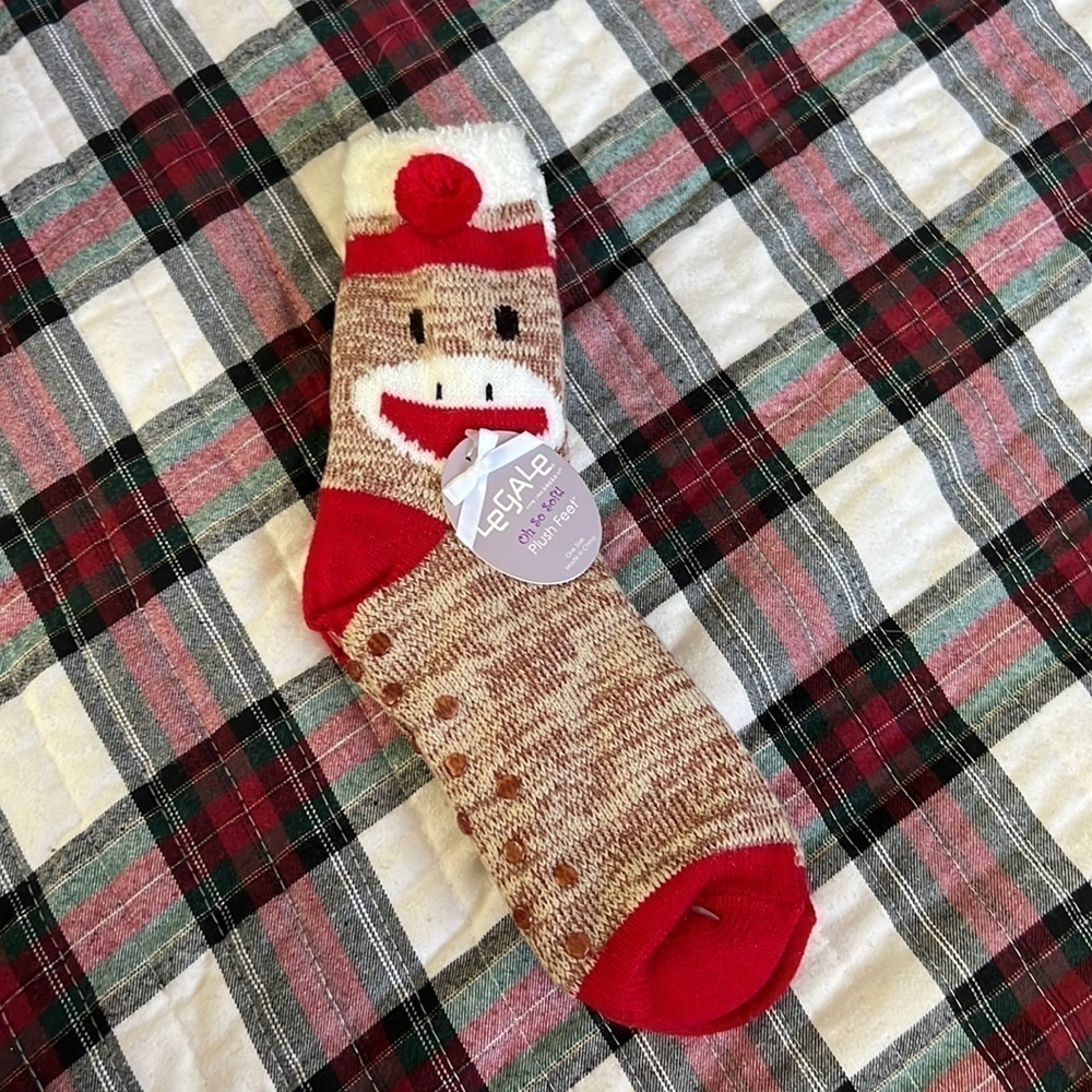 The sock monkey has rubber on the bottom for slip resistant.